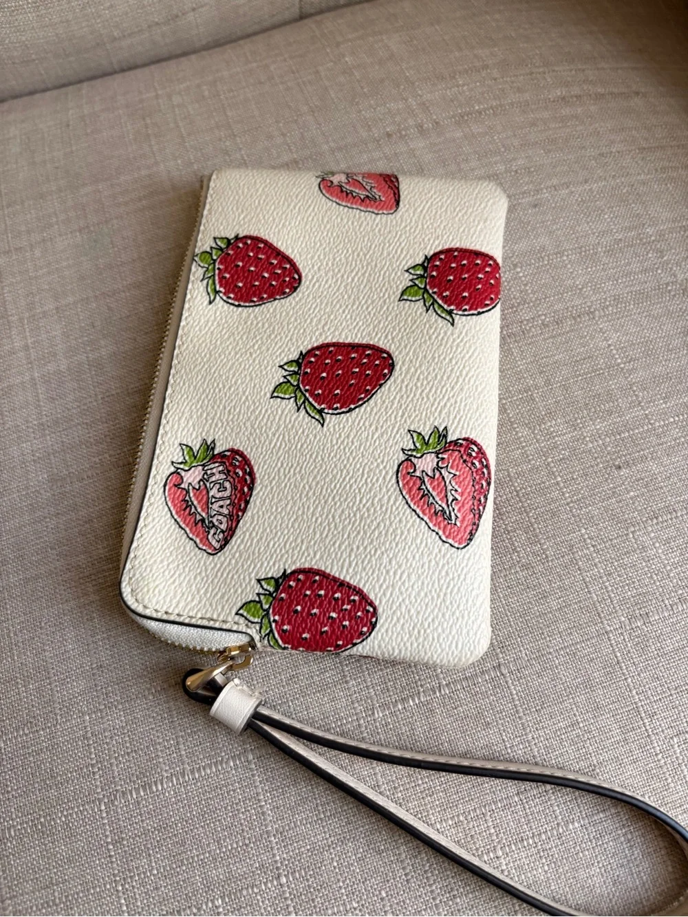 Coach White Strawberry Print Wristlet with Red and Green Accents